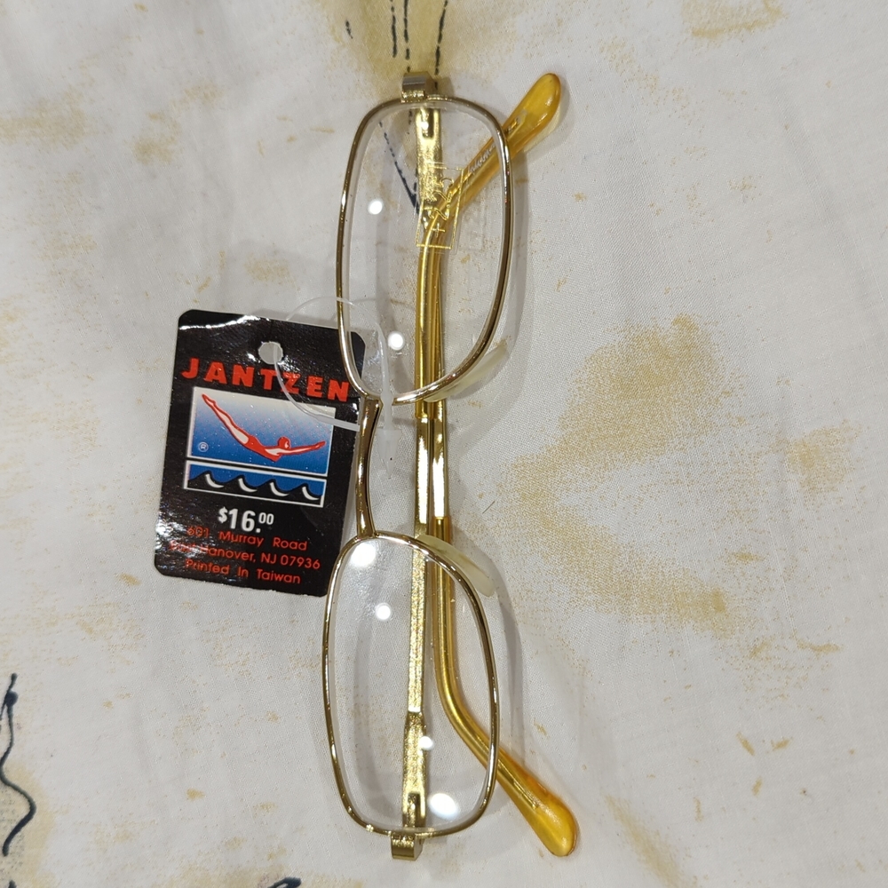 Gold metal wire +2.25 reading glasses. Unisex